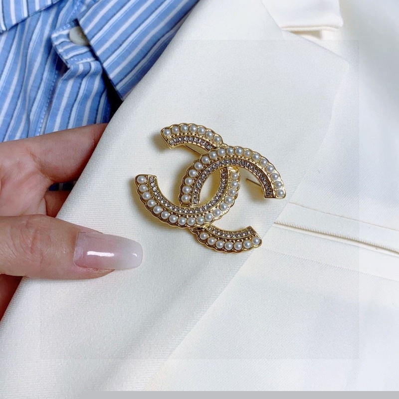 Ch*el brooches
